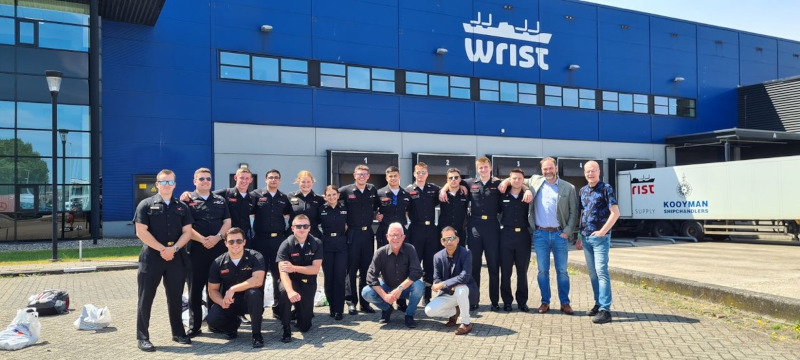 students stand in front of Wrist Ship Supply in Rotterdam