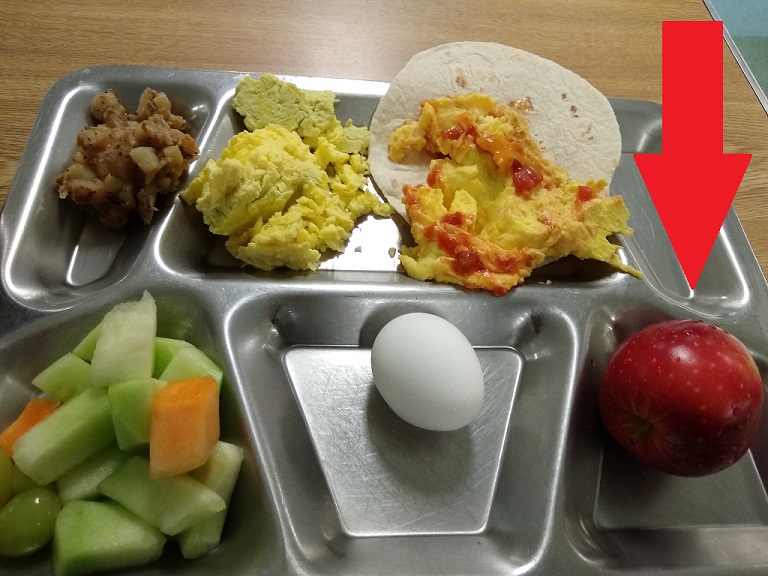 food tray with an apple