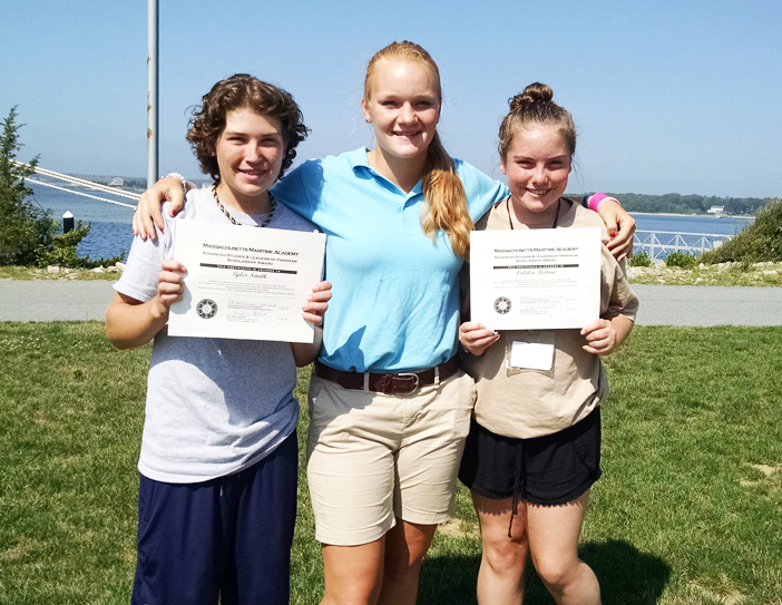 a couple kids with their aslp certificate