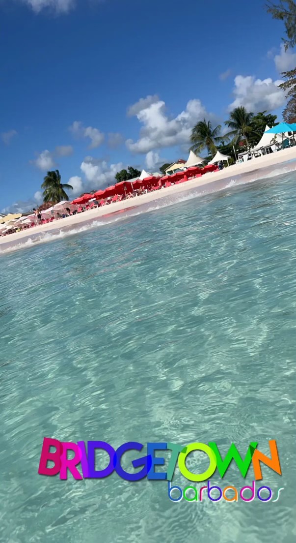 beach with red umbrellas