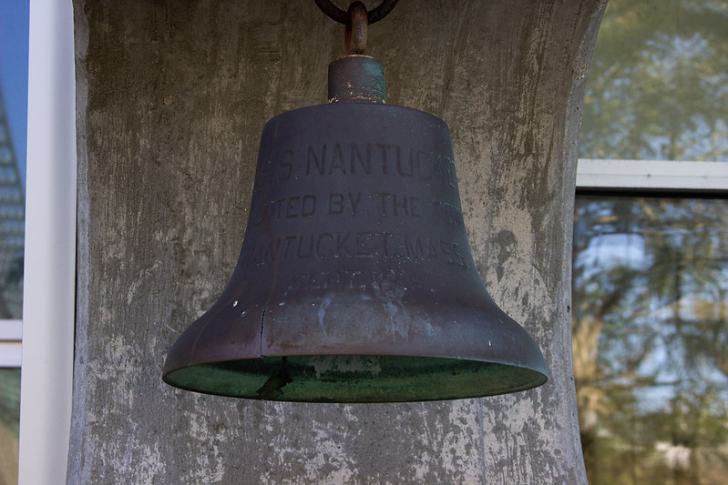 bell hanging outside of Harrington Building