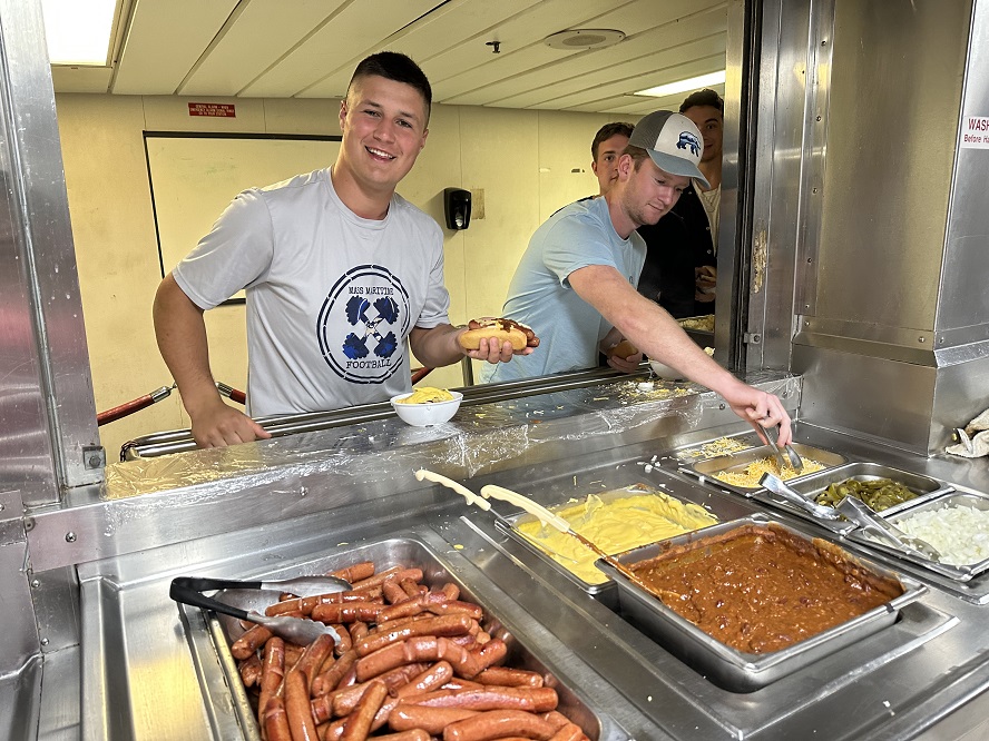 cadets eat snacks at super bowl party