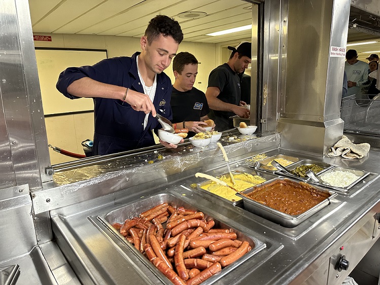 cadets eat snacks at super bowl party