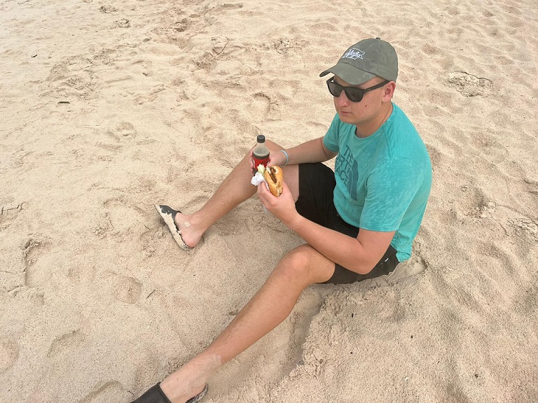 cadet eating lunch at beach