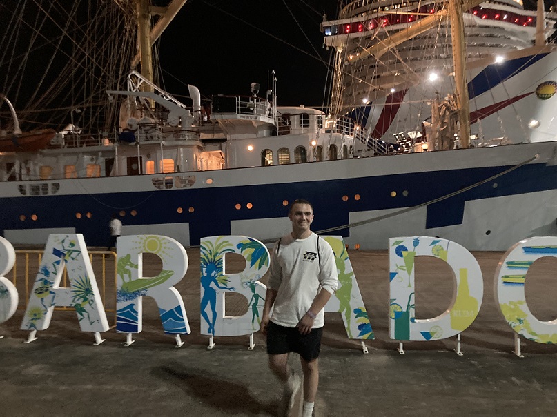 cadet on dock at night