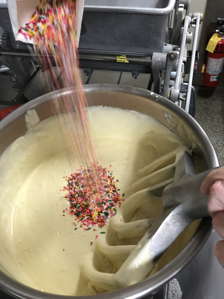 sprinkles poured into the batter