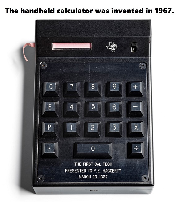 first calculator (black and bulky)
