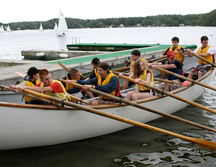 photo of sea cadets paddling on a row boat