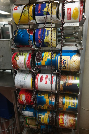 big cans are held in place with straps