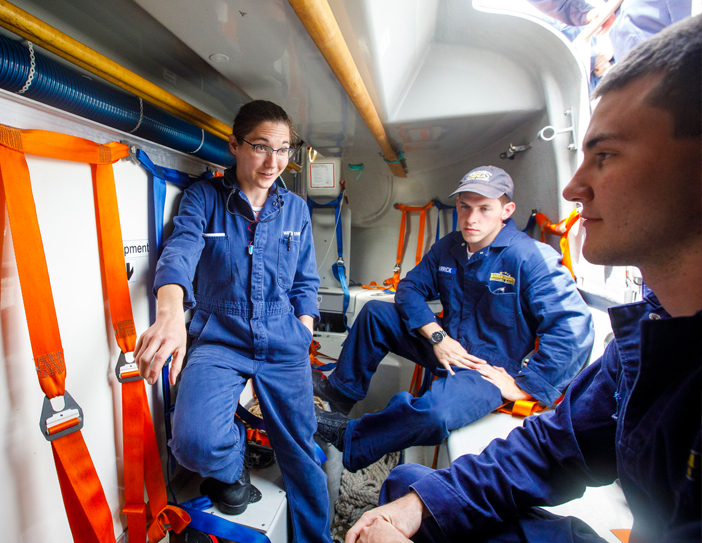 being taught in a safety boat