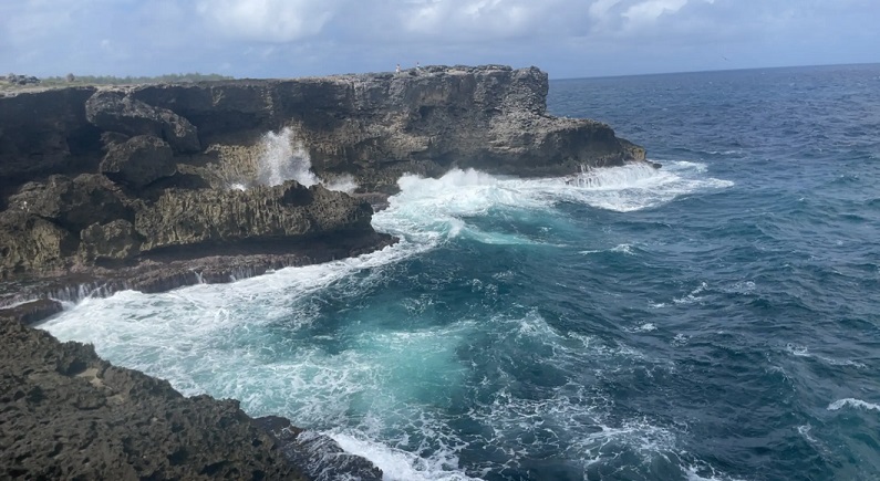 cliff with surf