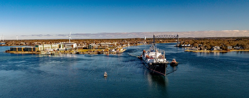 drone shot down to Kennedy, campus, and canal