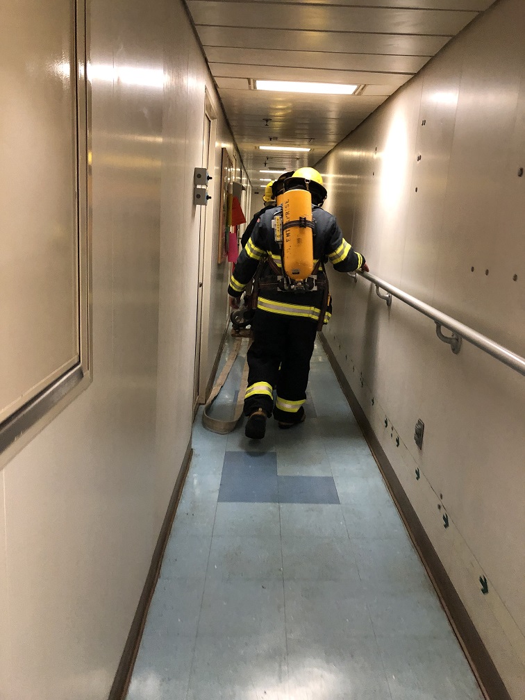 fireman walking down hall