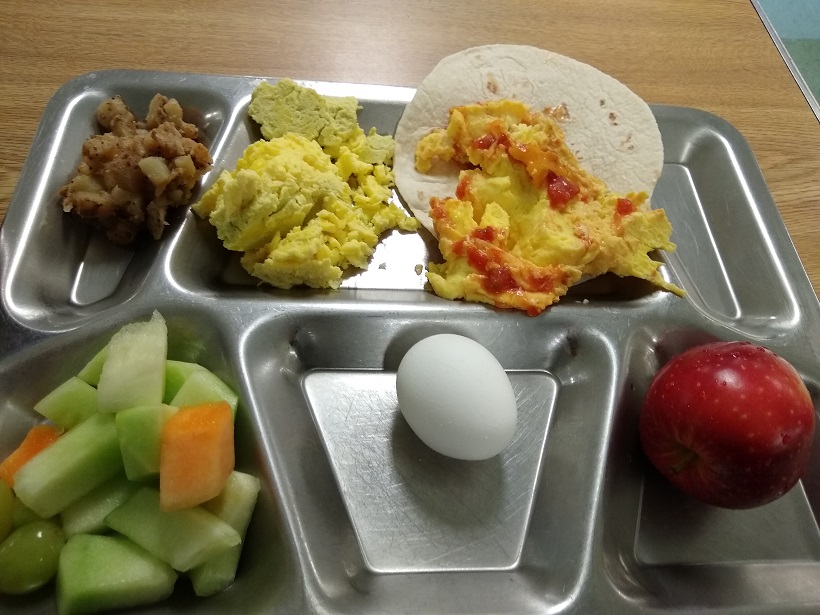 breakfast with eggs on tray