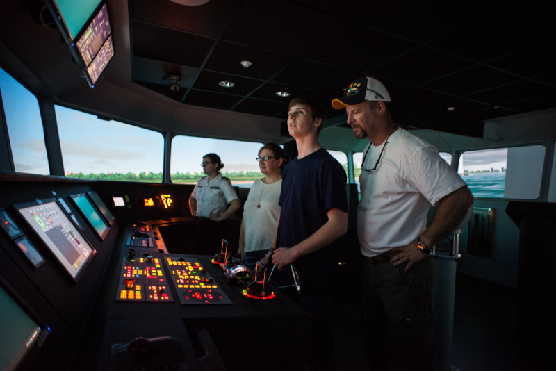 Family in ship simulator