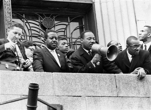 ML King on steps of school