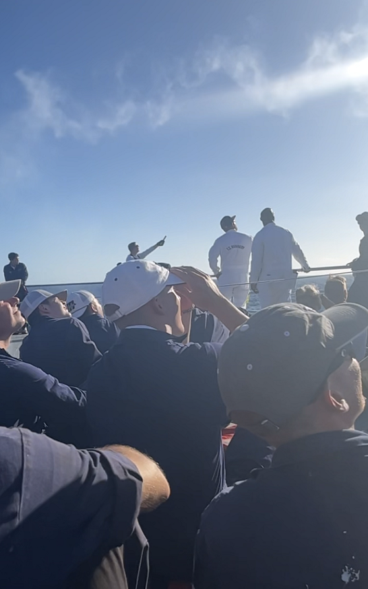 cadets on Helo deck watch pyrotechnics