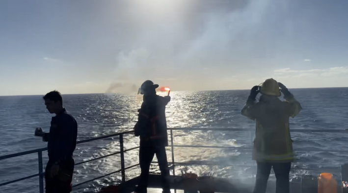 cadets on Helo deck watch pyrotechnics