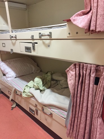 triple bunks in a cadet hold