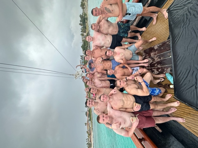 group shot on sailboat