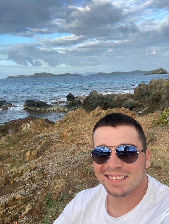 selfie of male cadet near beach