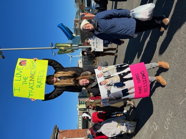 family with sign