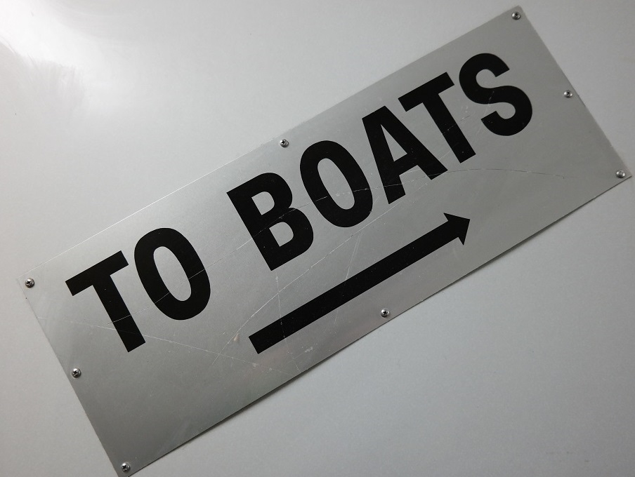 to the boats sign