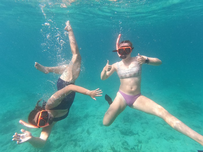 two female cadets underwater snorkeling
