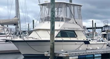 1 boat at dock shown from port forward quarter