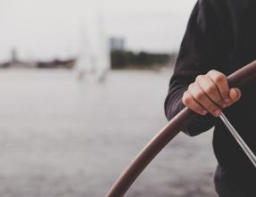 sailor at the wheel